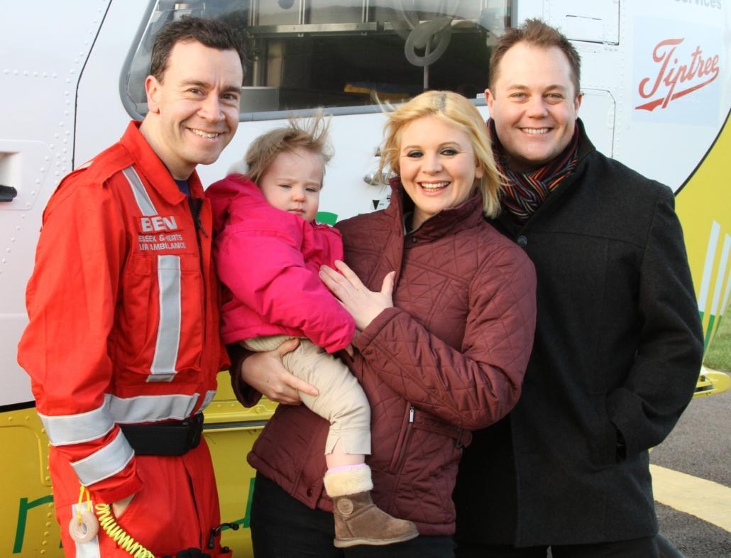 Maisie with Mum, Dad and Essex & Herts Air Ambulance Critical Care Team member