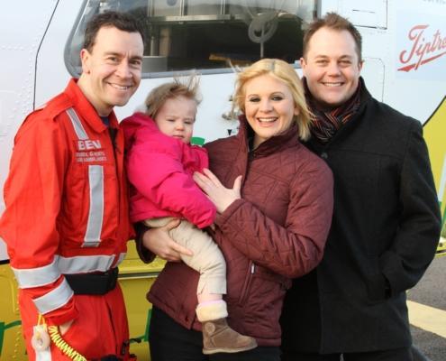 Maisie with Mum, Dad and Essex & Herts Air Ambulance Critical Care Team member