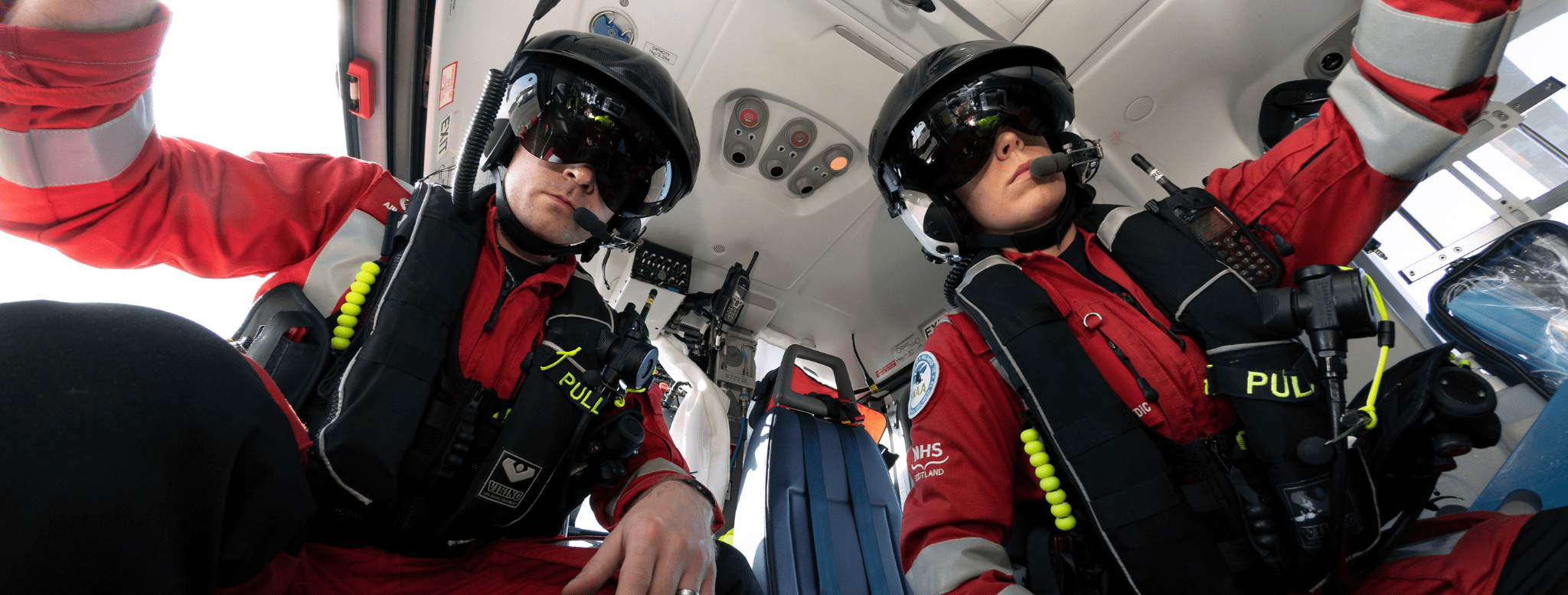 Aircrew wearing helmets and vision goggles