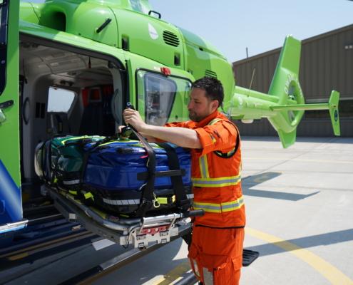 GWAAC Loading Gear Into Helicopter